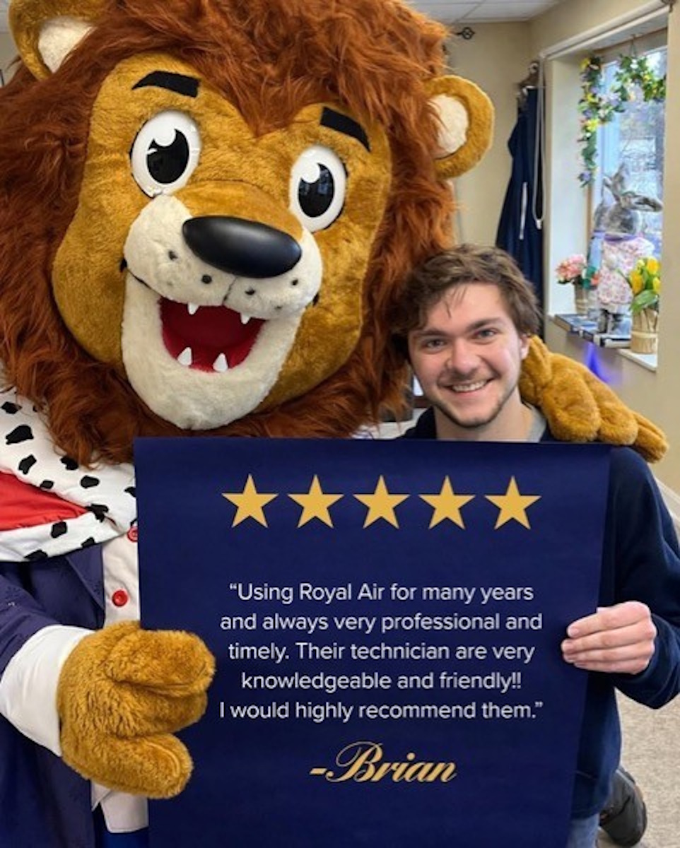 Reggie the royal lion with customer