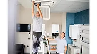 Workers-installing-ceiling-ventilation.jpg