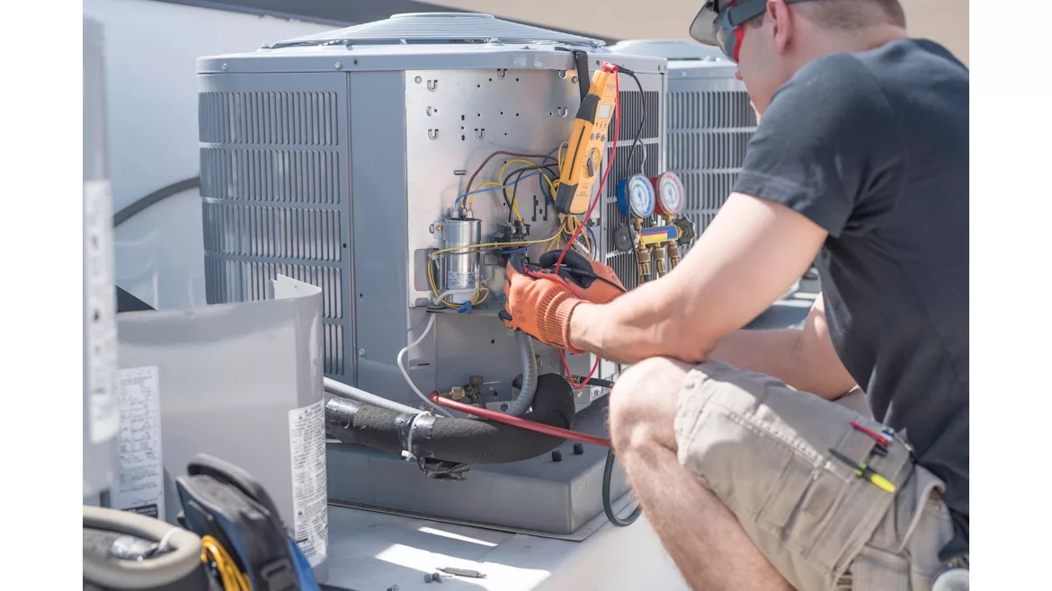 HVAC technician working.jpeg HVAC-technician-working.jpeg