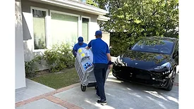 LA-Heating_Craning-moving-new-hvac-condensing-unit-onto-roof-(2).jpg