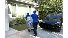 LA-Heating_Craning-moving-new-hvac-condensing-unit-onto-roof-(2).jpg