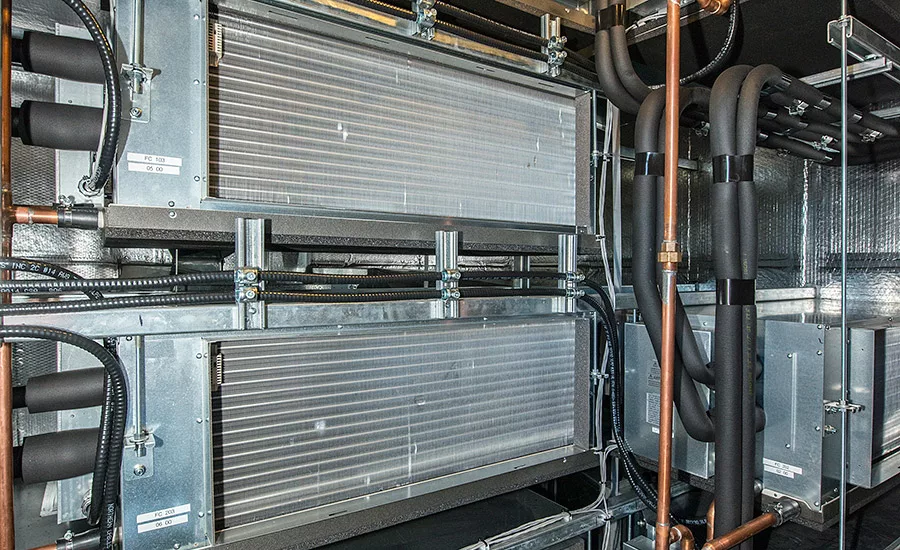 The two custom-fabricated air handlers contain air fain coils totaling 27 tons provided by VRF condensers.
