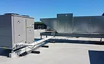 Two-stage 30-ton condenser (left) and modular makeup unit (right)