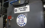 A 600-psig steam turbine generator uses steam pressure reduction to provide 4.9 MW power