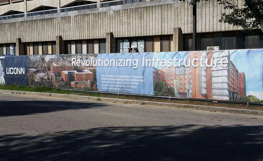 A NextGen banner advertises campus progress at the construction site