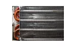 A round tube and plate fin coil