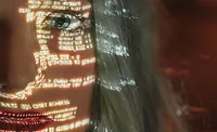 woman with code reflected on her face