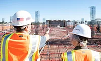 two construction workers two construction workers