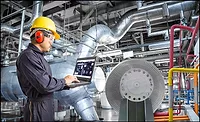 man with hard hat working on hvac equipment man with hard hat working on hvac equipment