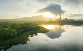 manufacturing plant near a lake
