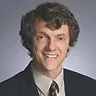 Es coogan headshot 900x550
