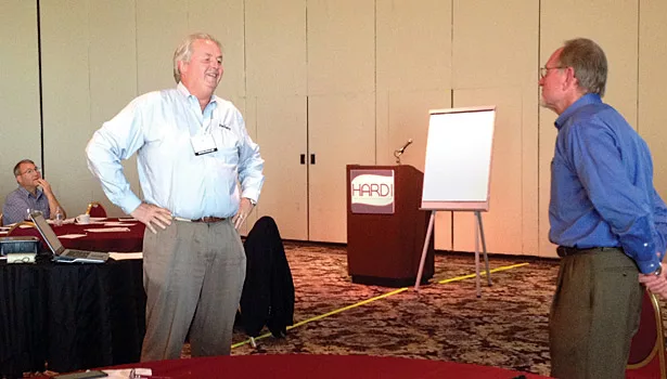 Norm Clark interacts with a participant during his session about developing high-performance sales.