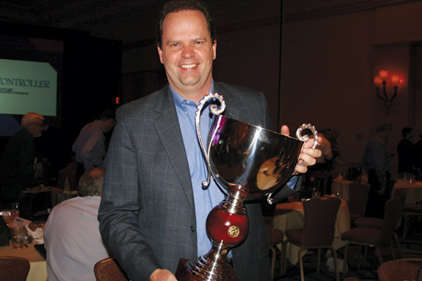 Thermostat Recycling Corp. (TRC) awarded Johnstone Supply the 2013 Big Man On Planet (BMOP) title and trophy