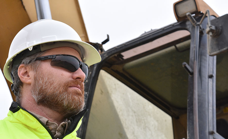 construction worker in safety glasses